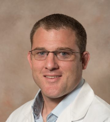 Headshot photo of Travis Neagle, PA-C