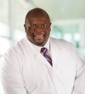 Headshot photo of Olumide Oyeyjpo, MD