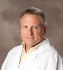Headshot photo of James White, MD
