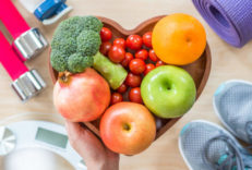 Healthy,Lifestyle,Concept,,Eating,Clean,Food,Good,Health,Dietary,In Healthy lifestyle concept, eating clean food good health dietary in heart dish with sporty aerobic body exercise workout training class gym equipment, weight scale and sports shoes in fitness center